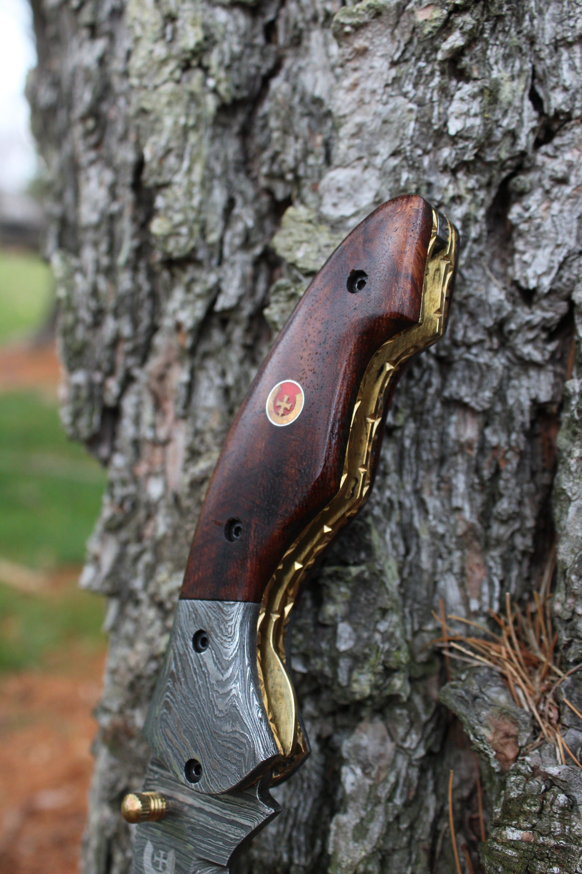 Damascus Steel Karambit Knife with a Rosewood Handle – RainwatersEdge